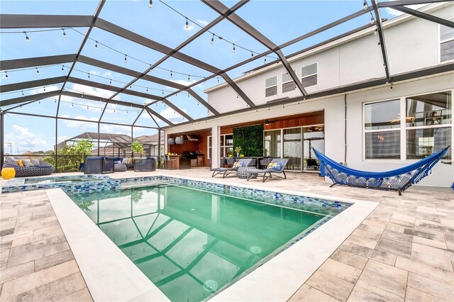 2926 Crest Wave Dr, Clermont, FL 34711 - view of pool featuring a patio area, a lanai, a pool with connected hot tub, and an outdoor hangout area