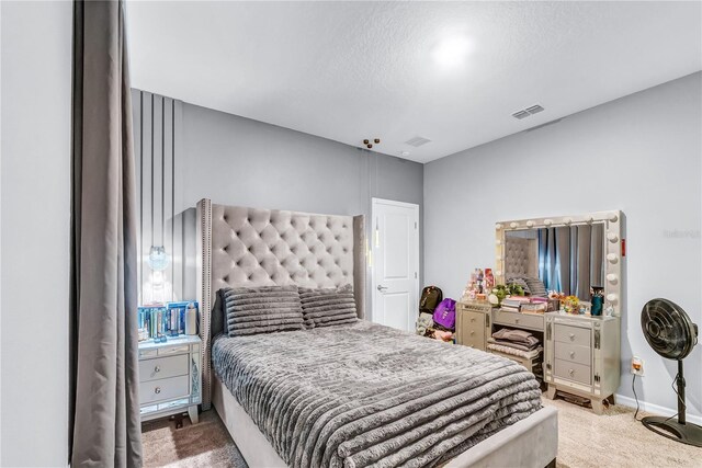 2926 Crest Wave Dr, Clermont, FL 34711 - carpeted bedroom featuring baseboards and a textured ceiling
