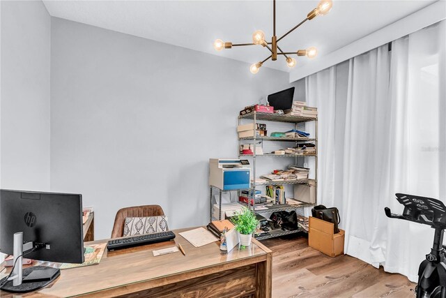 2926 Crest Wave Dr, Clermont, FL 34711 - office area featuring a chandelier and wood finished floors