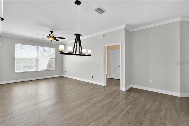 13500 Turtle Marsh Loop Unit 834, Orlando, FL 32837 - interior space with wood finished floors, visible vents, a ceiling fan, crown molding, and baseboards