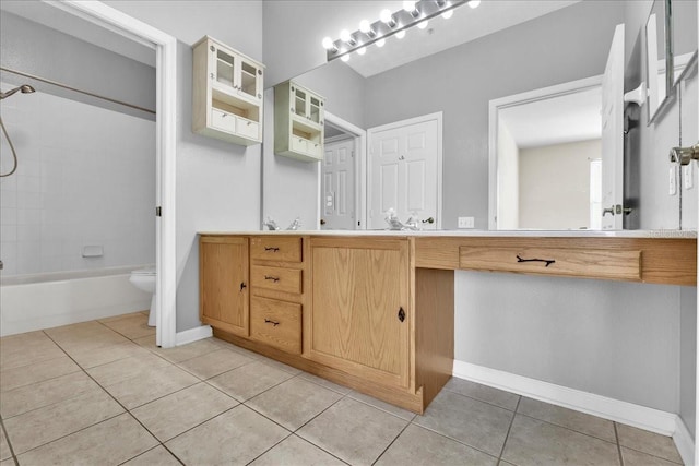 13500 Turtle Marsh Loop Unit 834, Orlando, FL 32837 - full bath featuring tile patterned flooring, shower / bathtub combination, toilet, vanity, and baseboards