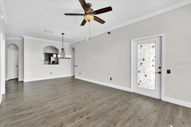 13500 Turtle Marsh Loop Unit 834, Orlando, FL 32837 - unfurnished living room with crown molding, wood finished floors, ceiling fan with notable chandelier, arched walkways, and baseboards