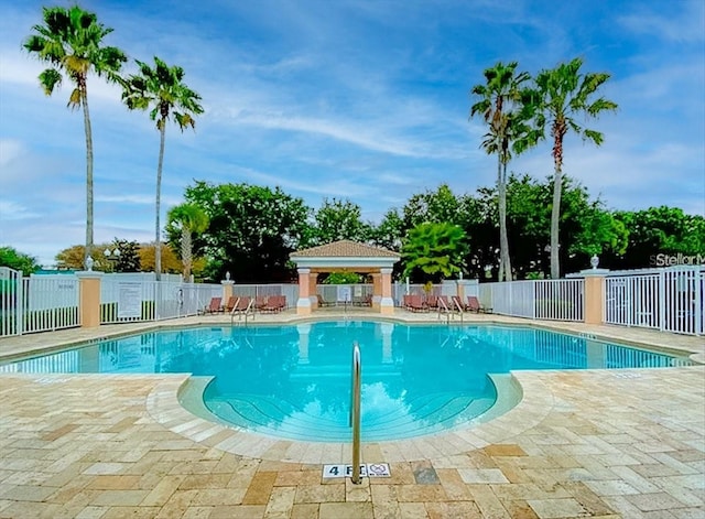 13500 Turtle Marsh Loop Unit 834, Orlando, FL 32837 - pool with fence, a patio, and a gazebo