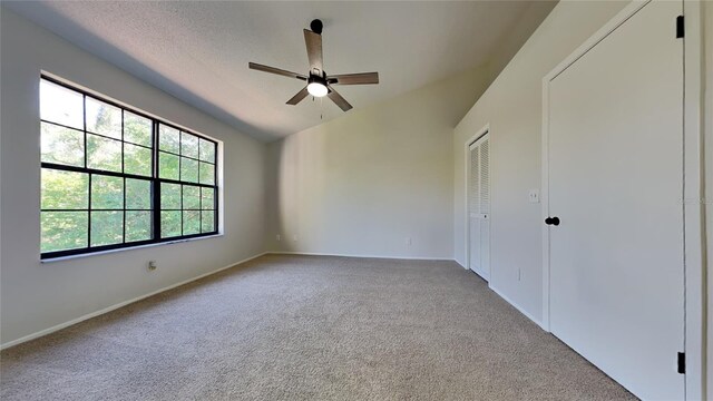 607 Northbridge Dr, Altamonte Springs, FL 32714 - unfurnished bedroom with baseboards, lofted ceiling, a closet, ceiling fan, and carpet floors