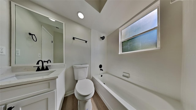 607 Northbridge Dr, Altamonte Springs, FL 32714 - bathroom featuring wood finished floors, toilet, vanity, baseboards, and shower / bathing tub combination