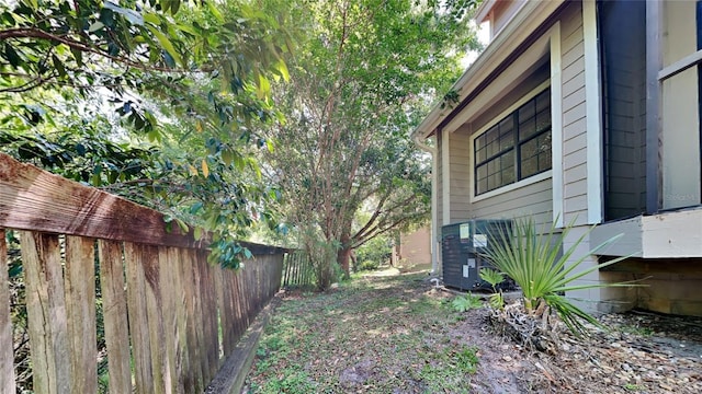 607 Northbridge Dr, Altamonte Springs, FL 32714 - view of yard featuring central AC and fence