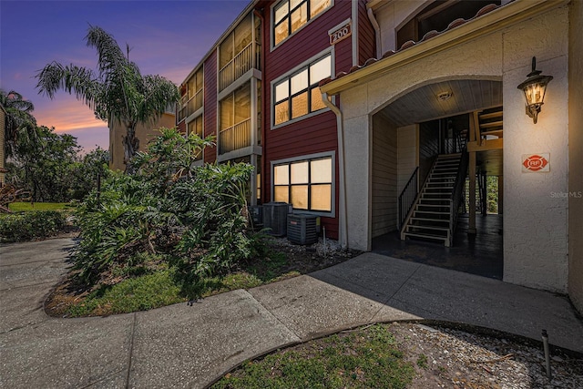 11901 4th St N Unit 2107, Saint Petersburg, FL 33716 - entrance to property featuring central AC and stucco siding