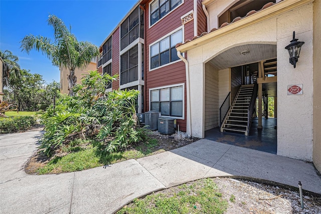 11901 4th St N Unit 2107, Saint Petersburg, FL 33716 - property entrance featuring central AC unit