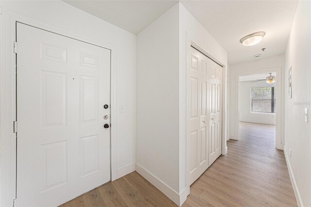 11901 4th St N Unit 2107, Saint Petersburg, FL 33716 - entryway featuring light wood-style floors and baseboards