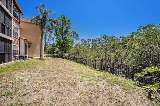 11901 4th St N Unit 2107, Saint Petersburg, FL 33716 - view of yard with central AC unit