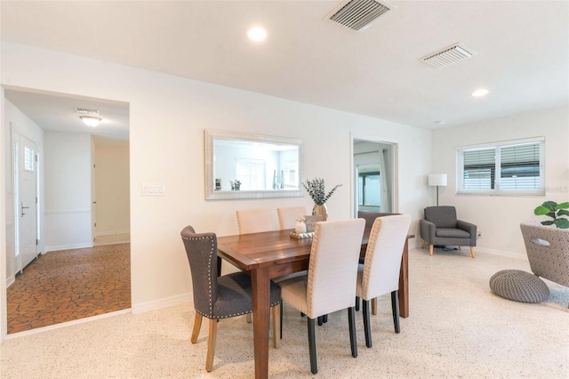 dining room with recessed lighting, visible vents, and baseboards