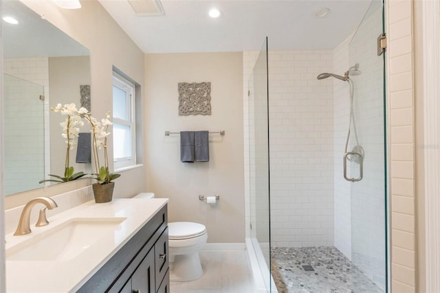 full bath with recessed lighting, toilet, vanity, visible vents, and a stall shower