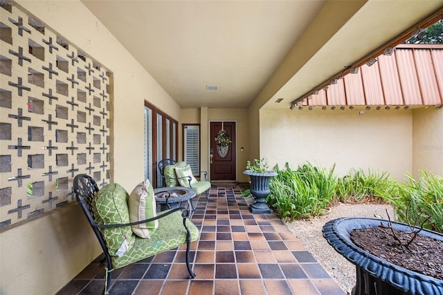 doorway to property with stucco siding