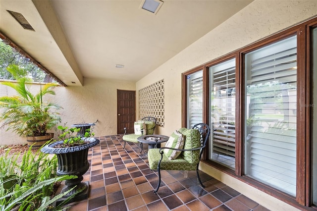 view of patio featuring visible vents