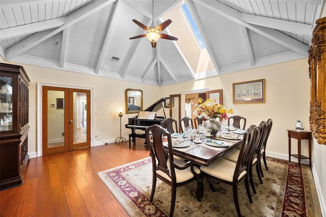 dining space featuring wood ceiling, a ceiling fan, baseboards, and french doors