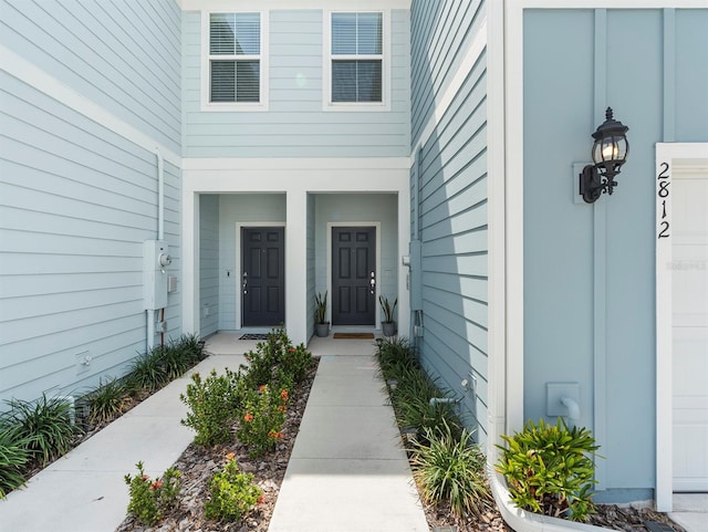 2812 Bright Bird Ln, Winter Park, FL 32792 - view of exterior entry with a porch