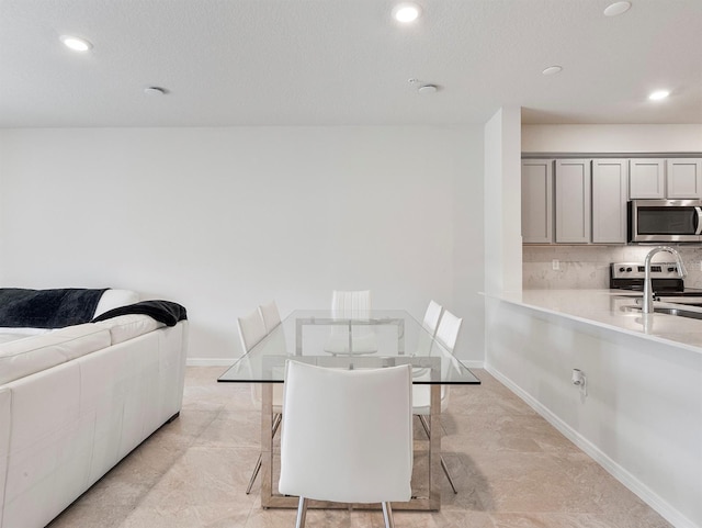 2812 Bright Bird Ln, Winter Park, FL 32792 - dining room with baseboards and recessed lighting