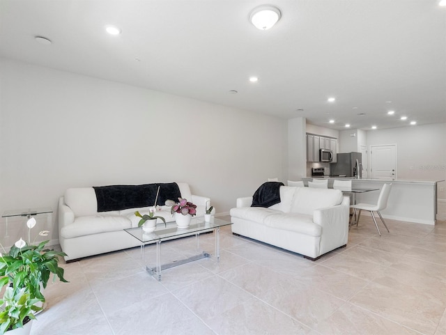 2812 Bright Bird Ln, Winter Park, FL 32792 - living room featuring recessed lighting, baseboards, and light tile patterned floors