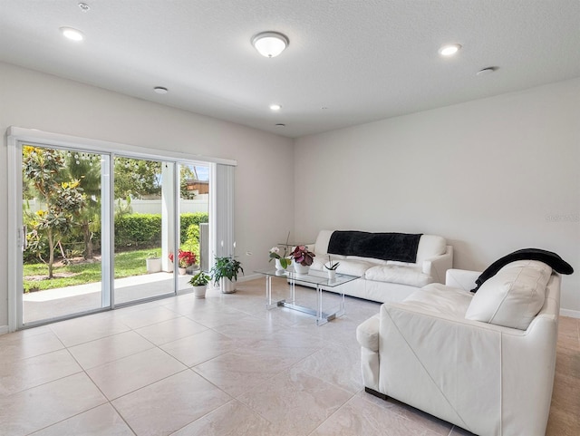 2812 Bright Bird Ln, Winter Park, FL 32792 - living area featuring baseboards, recessed lighting, and light tile patterned floors