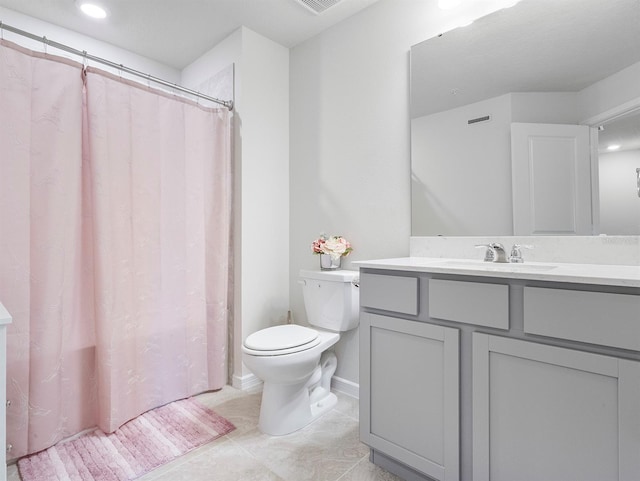 2812 Bright Bird Ln, Winter Park, FL 32792 - bathroom with curtained shower, visible vents, toilet, and vanity