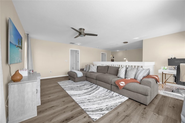 1114 Landale Ct, Orlando, FL 32828 - living room featuring a ceiling fan and wood finished floors