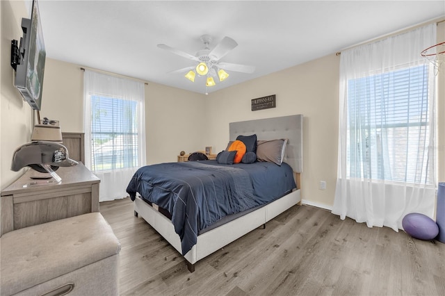 1114 Landale Ct, Orlando, FL 32828 - bedroom with wood finished floors and ceiling fan