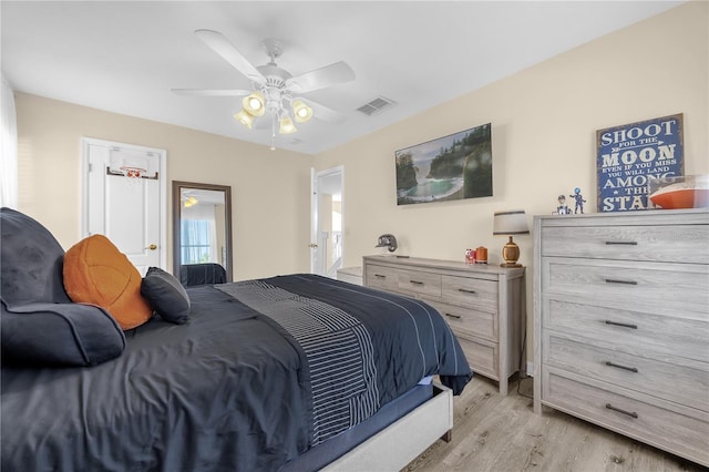 1114 Landale Ct, Orlando, FL 32828 - bedroom with light wood-style flooring and ceiling fan