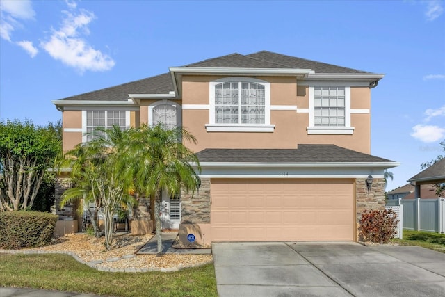 1114 Landale Ct, Orlando, FL 32828 - view of front of property with a garage, stone siding, stucco siding, and concrete driveway