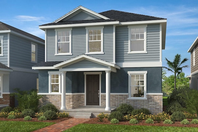 view of front of home featuring stone siding and stucco siding