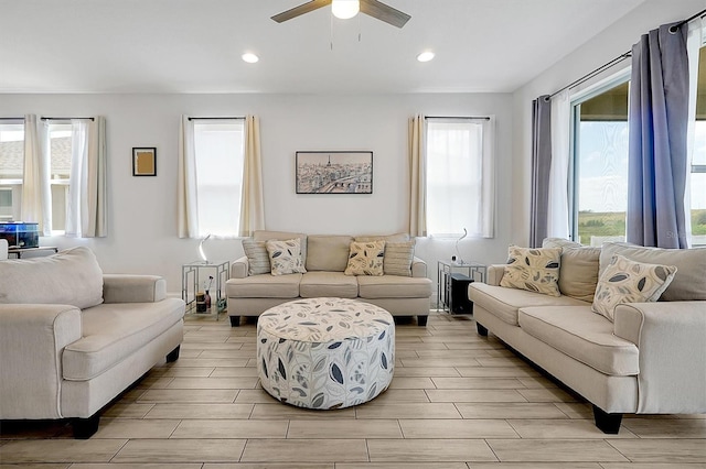 260 Lake Smart Cir, Winter Haven, FL 33881 - living area featuring a ceiling fan, wood finish floors, plenty of natural light, and recessed lighting