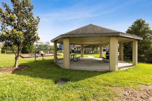 view of home's community featuring a lawn, a gazebo, and playground community