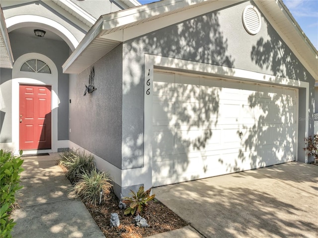 166 Laurel Ridge Pass, Davenport, FL 33897 - exterior space with stucco siding
