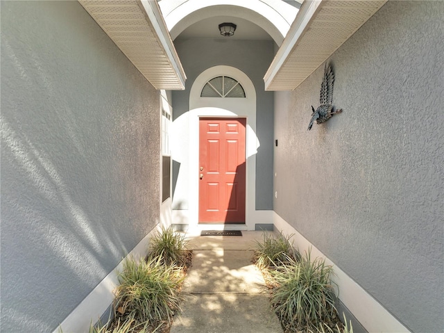 166 Laurel Ridge Pass, Davenport, FL 33897 - entrance to property featuring stucco siding