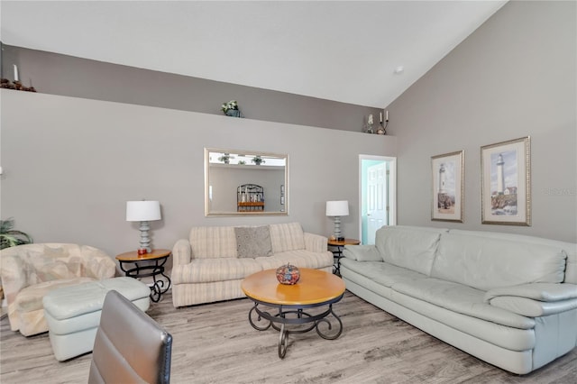 166 Laurel Ridge Pass, Davenport, FL 33897 - living room with high vaulted ceiling and wood finished floors