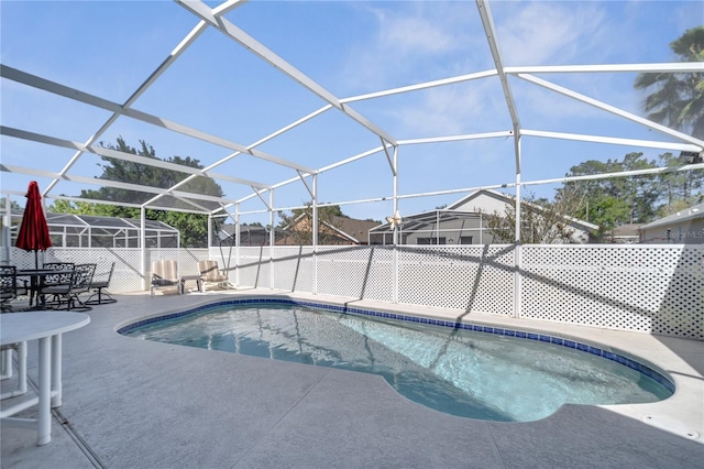 166 Laurel Ridge Pass, Davenport, FL 33897 - view of pool featuring a patio, a fenced in pool, and glass enclosure