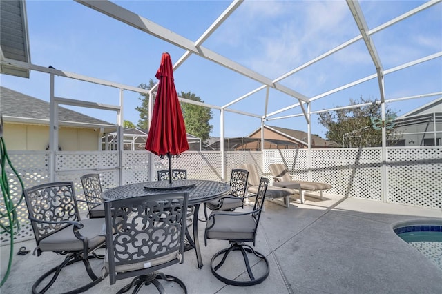 166 Laurel Ridge Pass, Davenport, FL 33897 - view of patio / terrace with a lanai, outdoor dining area, and a fenced in pool