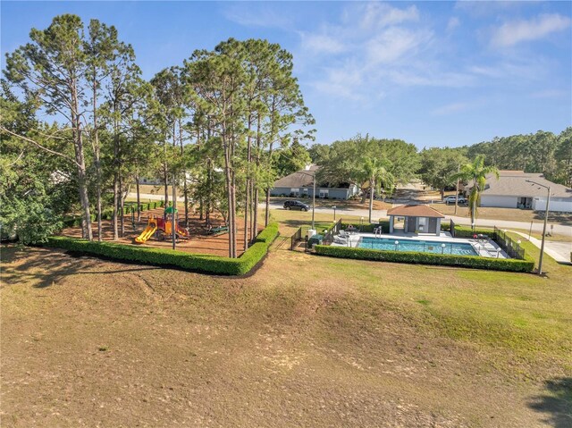 166 Laurel Ridge Pass, Davenport, FL 33897 - view of yard featuring playground community and an outdoor pool