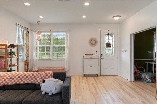 690 Cascading Creek Ln, Winter Garden, FL 34787 - interior space featuring recessed lighting, a wealth of natural light, and light wood finished floors