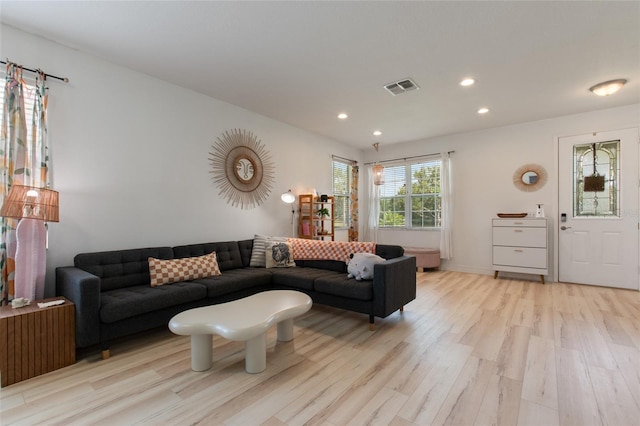690 Cascading Creek Ln, Winter Garden, FL 34787 - living room featuring recessed lighting, light wood-type flooring, and visible vents