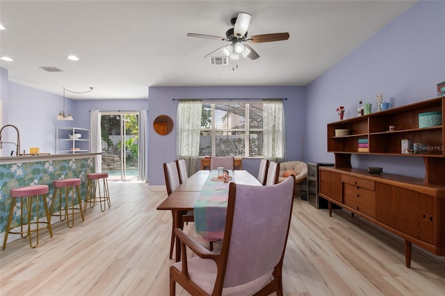 690 Cascading Creek Ln, Winter Garden, FL 34787 - dining space with light wood-style floors, a ceiling fan, recessed lighting, and visible vents