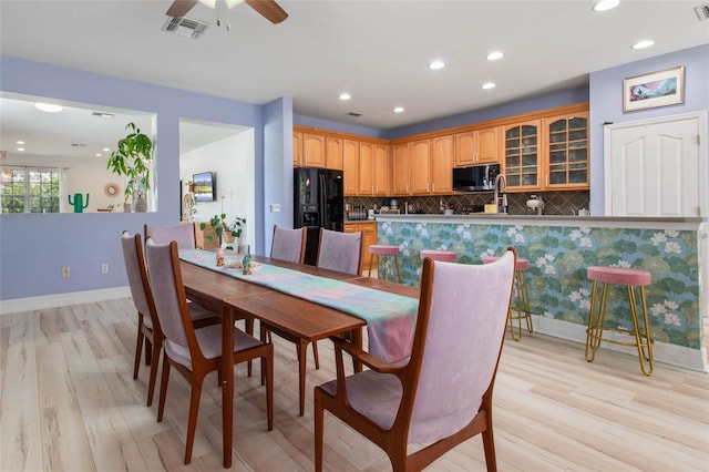 690 Cascading Creek Ln, Winter Garden, FL 34787 - dining area with visible vents, recessed lighting, and light wood finished floors