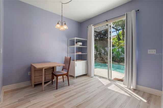 690 Cascading Creek Ln, Winter Garden, FL 34787 - interior space featuring baseboards, a notable chandelier, and wood finished floors