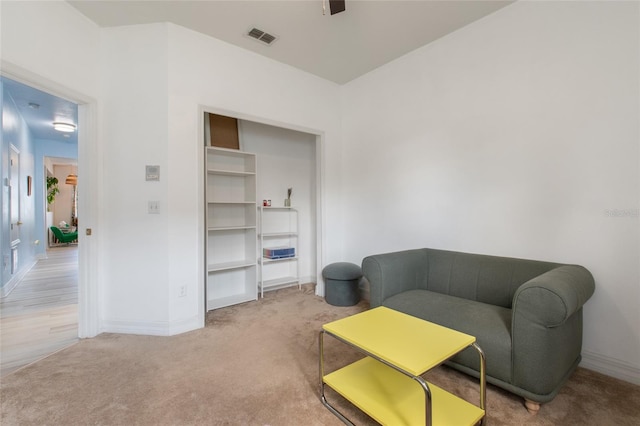 690 Cascading Creek Ln, Winter Garden, FL 34787 - sitting room featuring visible vents, carpet flooring, baseboards, and a ceiling fan