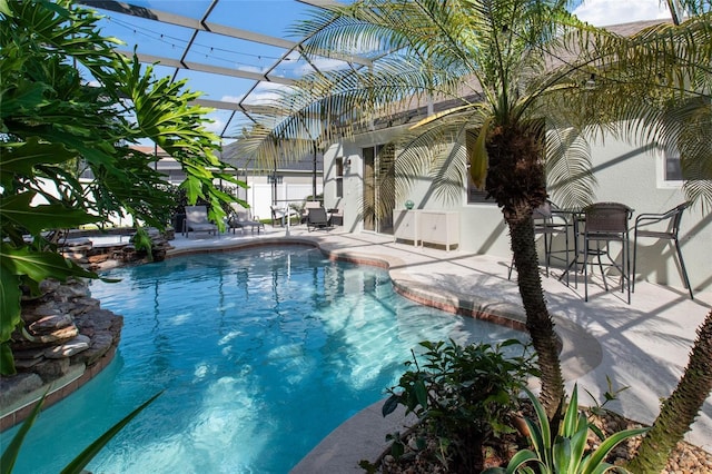 690 Cascading Creek Ln, Winter Garden, FL 34787 - outdoor pool featuring a patio and a lanai