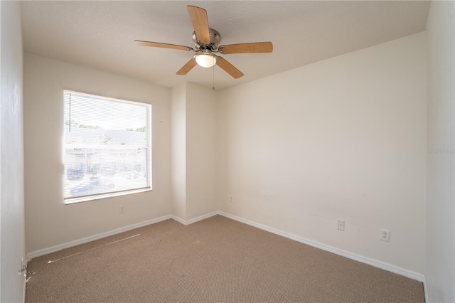 2434 Temple Grove Ln, Kissimmee, FL 34741 - empty room featuring baseboards, carpet flooring, and ceiling fan