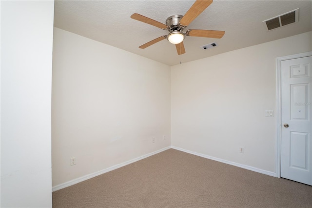 2434 Temple Grove Ln, Kissimmee, FL 34741 - spare room featuring baseboards, a ceiling fan, visible vents, and carpet floors