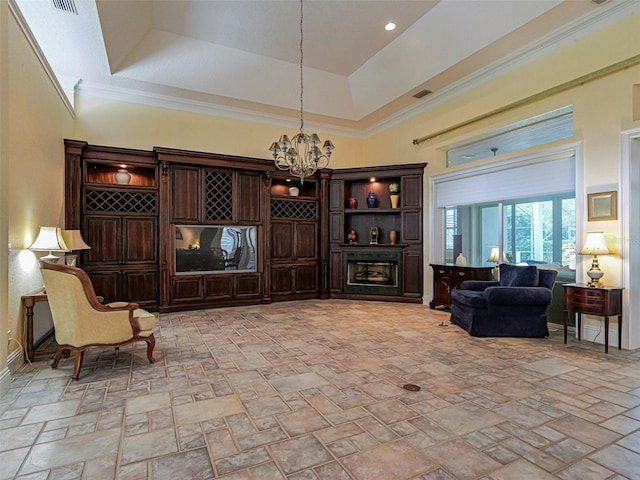 2266 12th St, Vero Beach, FL 32960 - living area featuring baseboards, stone tile flooring, a chandelier, and visible vents
