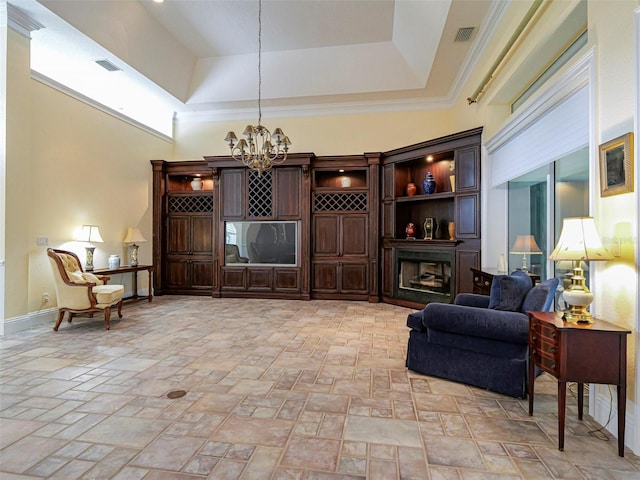 2266 12th St, Vero Beach, FL 32960 - living area with stone finish floor, visible vents, and an inviting chandelier