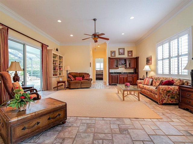 2266 12th St, Vero Beach, FL 32960 - living room with recessed lighting, stone tile floors, a ceiling fan, and ornamental molding