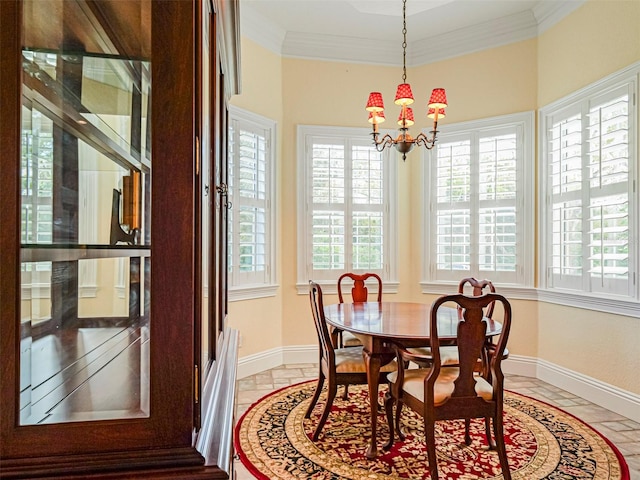 2266 12th St, Vero Beach, FL 32960 - dining area with baseboards, crown molding, and a chandelier